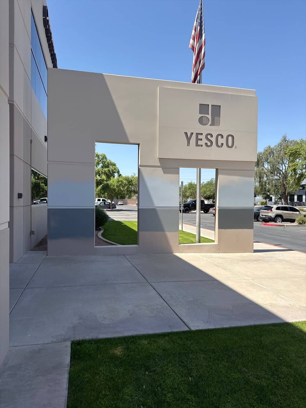 Freshly finished YESCO entry monument feature with logo panel and canopy.