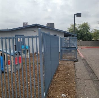 School Campus Fencing And Gates Repainted By ACP Commercial Painting Company