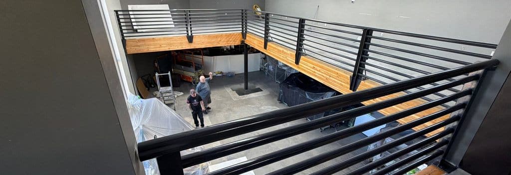 ACP Crew Electrostatically Coating Mezzanine Railings In Scottsdale, AZ