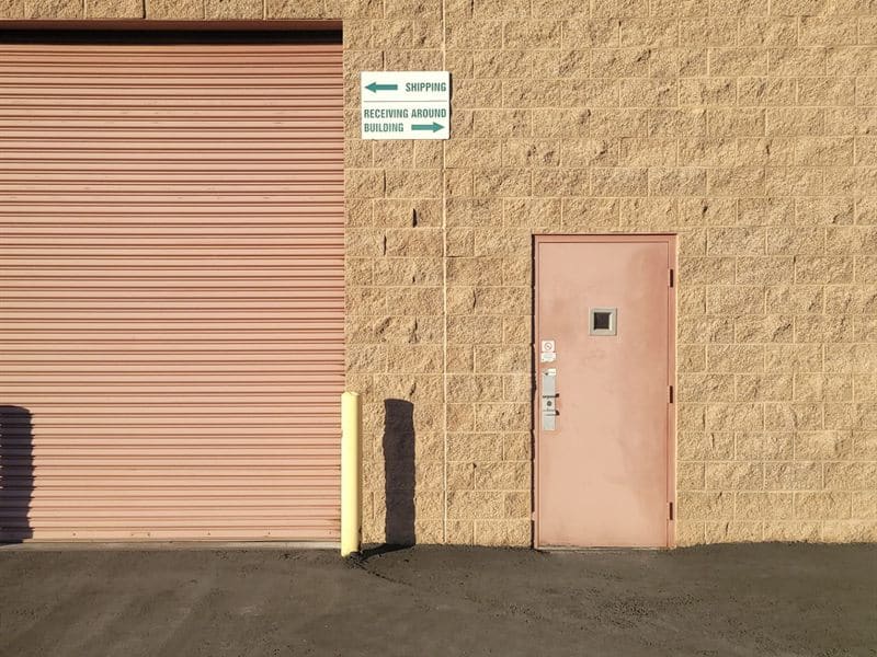 Loading dock doors repainted by ACP Commercial Painting Company in Tempe, AZ