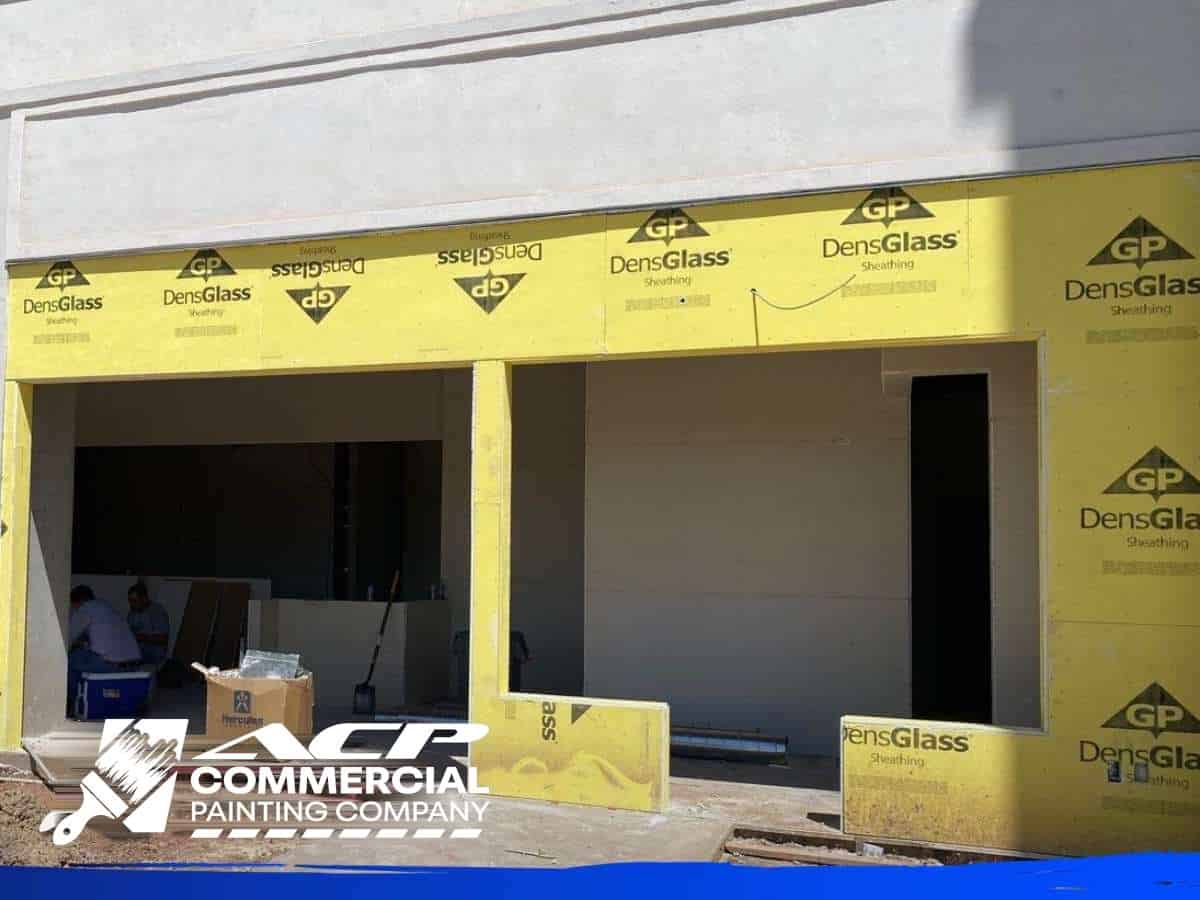 Retail buildout interior being prepared for a high-traffic paint finish, ACP Commercial Painting Company